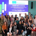 Participants of the Erasmus+ EqualEdu final international meeting and conference pose for a group photo at Kauno kolegija Higher Education Institution in Kaunas, Lithuania, in front of the EqualEdu project presentation screen, celebrating the successful completion of the project.